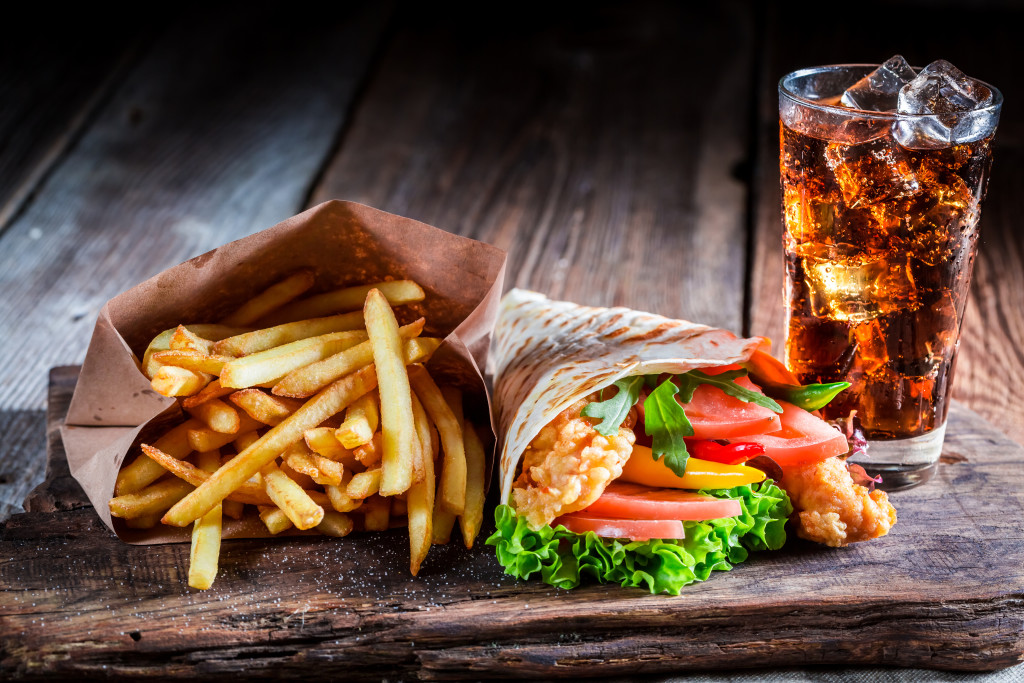 Fresh kebab with fries and cod drink